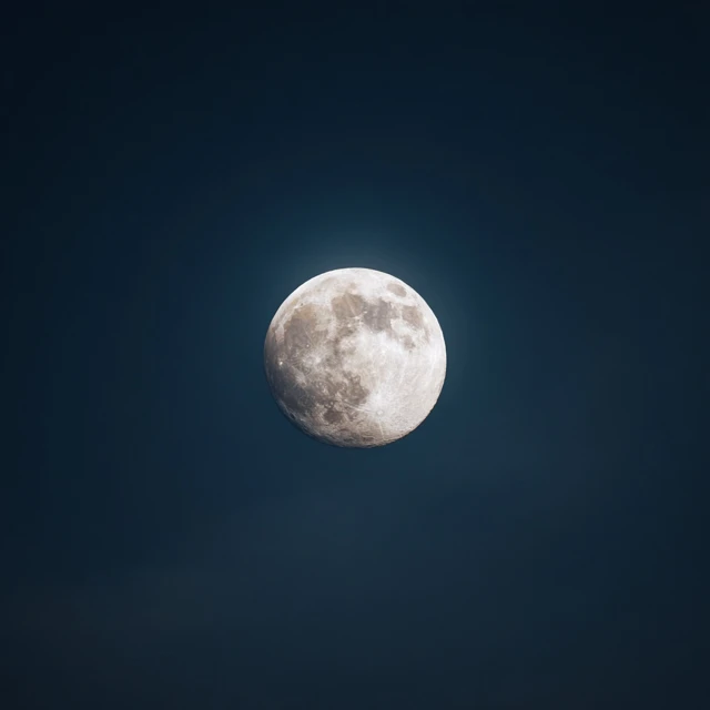 Full Moon Against Dark Blue Sky
